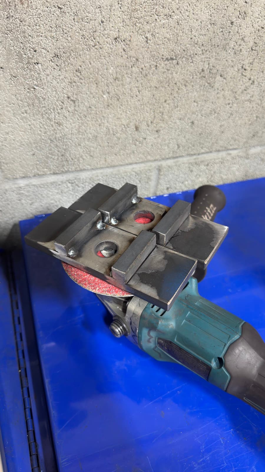 Custom-built steel replacement part for a lathe